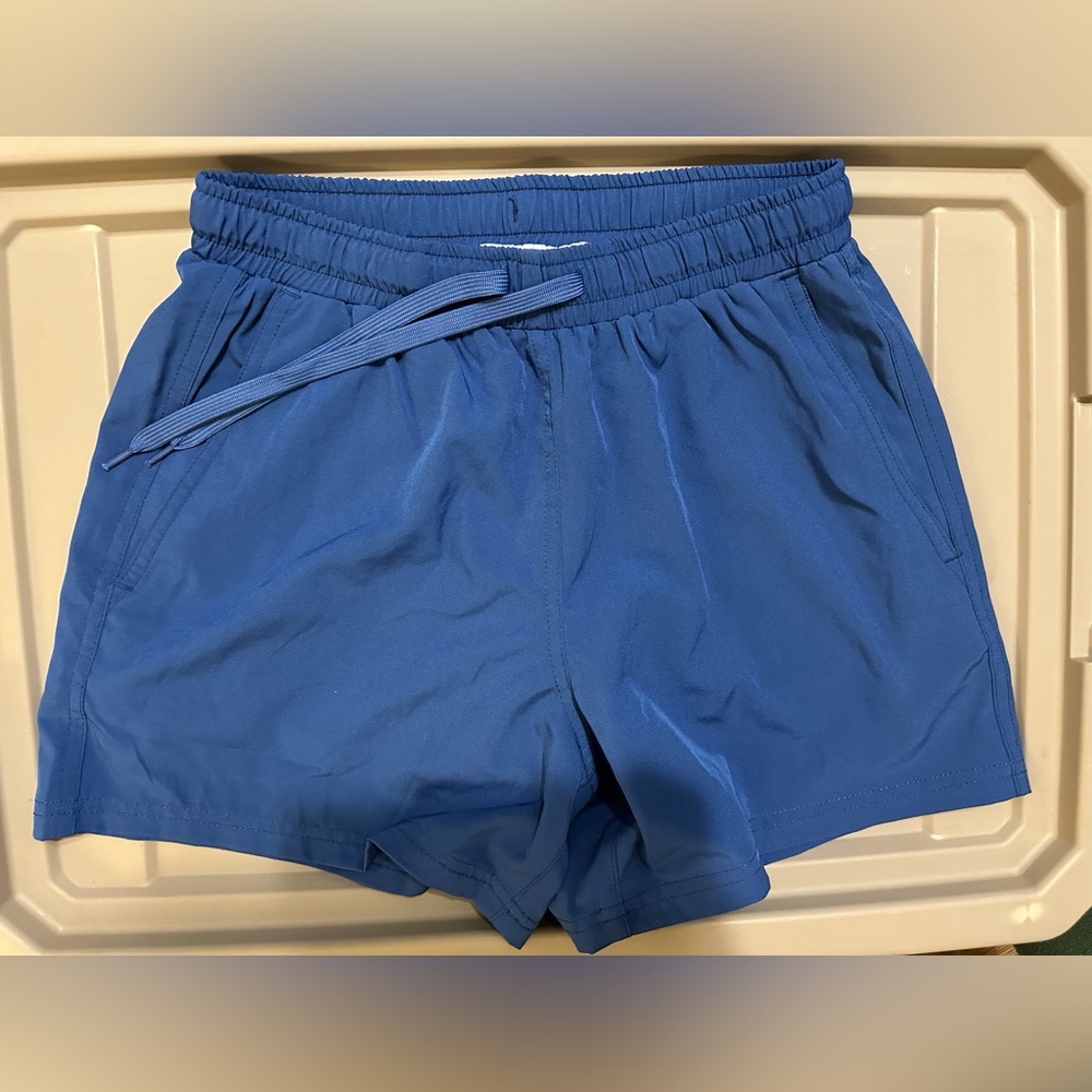 Kortni Jeane royal blue men’s small swim trunks